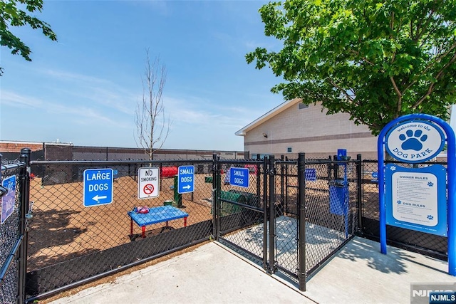 129 Eisenhower Ln Unit 2109, Wood Ridge, NJ 07075 - view of community featuring a dog friendly area and a gate