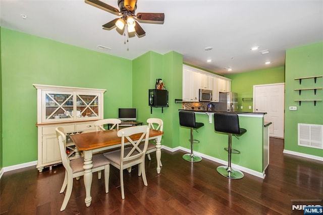 129 Eisenhower Ln Unit 2109, Wood Ridge, NJ 07075 - dining area featuring baseboards, dark wood-style floors, a ceiling fan, and recessed lighting