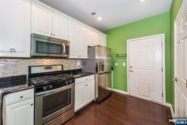 129 Eisenhower Ln Unit 2109, Wood Ridge, NJ 07075 - kitchen with stainless steel appliances, white cabinetry, baseboards, tasteful backsplash, and dark wood-style floors