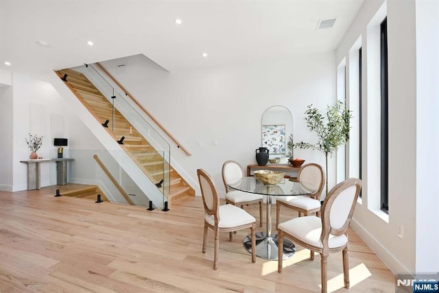 262 Webster Ave Unit 2, Jersey City, NJ 07307 - dining area featuring stairs, wood finished floors, recessed lighting, and healthy amount of natural light