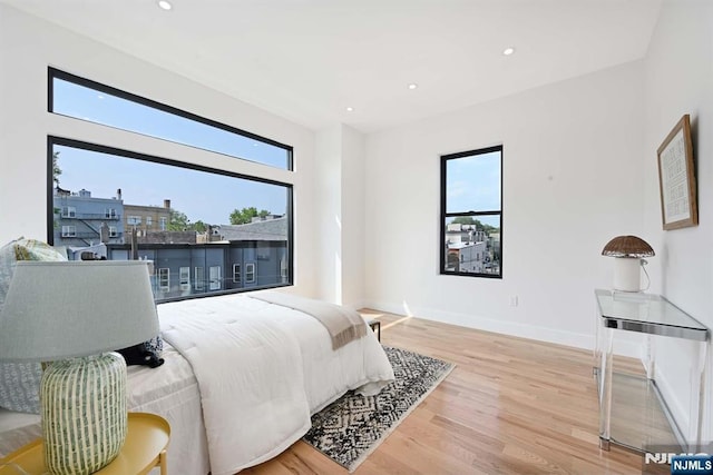 262 Webster Ave Unit 2, Jersey City, NJ 07307 - bedroom with wood finished floors and recessed lighting