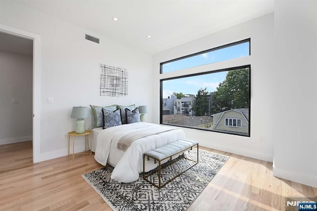 262 Webster Ave Unit 2, Jersey City, NJ 07307 - bedroom with wood finished floors and recessed lighting