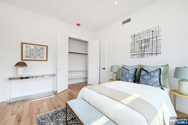 262 Webster Ave Unit 2, Jersey City, NJ 07307 - bedroom featuring light wood finished floors, a closet, and recessed lighting