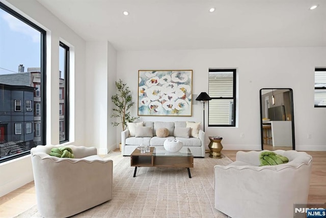 262 Webster Ave Unit 2, Jersey City, NJ 07307 - living room with recessed lighting and light wood finished floors