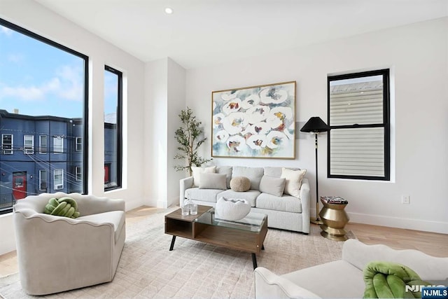 262 Webster Ave Unit 2, Jersey City, NJ 07307 - living room with baseboards and light wood-type flooring