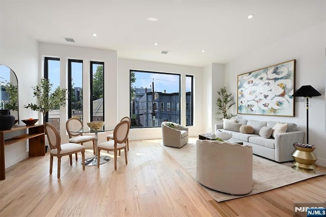 262 Webster Ave Unit 2, Jersey City, NJ 07307 - living area featuring light wood-style floors, plenty of natural light, and recessed lighting