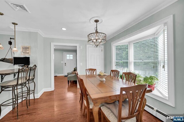 39 N 5th St, Park Ridge, NJ 07656 - dining space featuring a baseboard heating unit, ornamental molding, a chandelier, wood finished floors, and recessed lighting