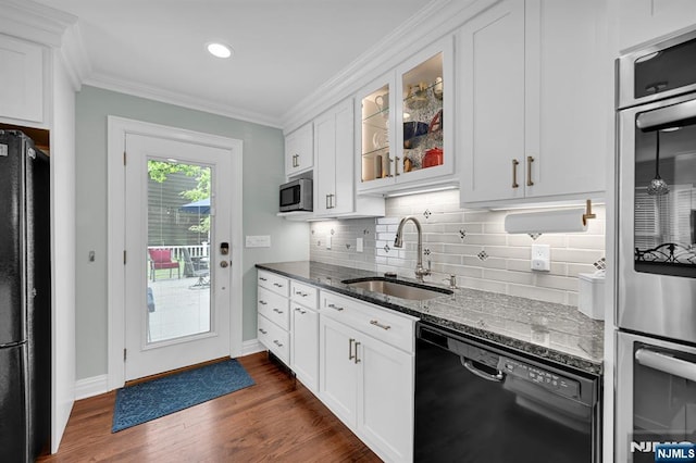 39 N 5th St, Park Ridge, NJ 07656 - kitchen featuring black appliances, dark stone countertops, glass insert cabinets, tasteful backsplash, and white cabinets