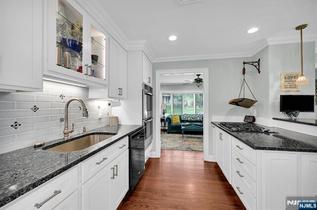 39 N 5th St, Park Ridge, NJ 07656 - kitchen with gas stovetop, dishwasher, glass insert cabinets, white cabinets, and dark wood-type flooring