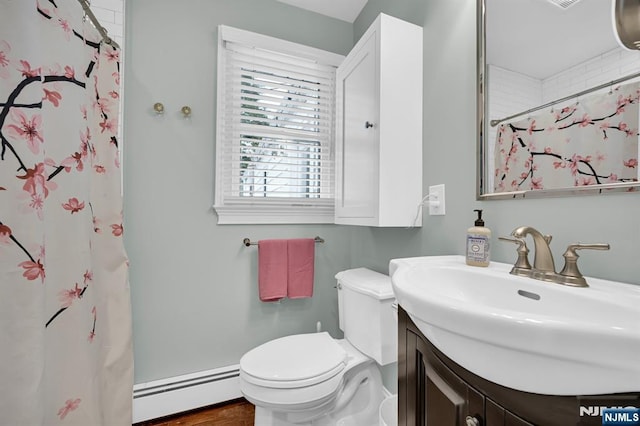 39 N 5th St, Park Ridge, NJ 07656 - full bath with baseboard heating, vanity, and a shower with curtain