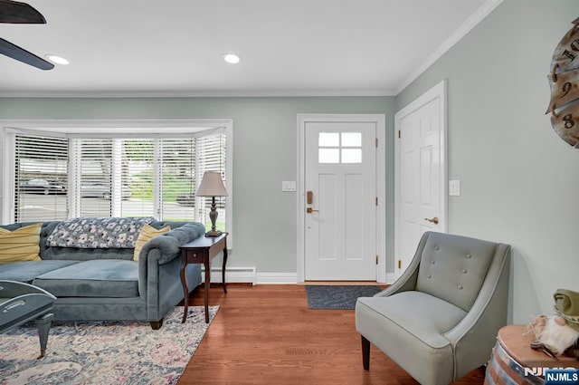 39 N 5th St, Park Ridge, NJ 07656 - entryway featuring a baseboard heating unit, wood finished floors, crown molding, recessed lighting, and a ceiling fan