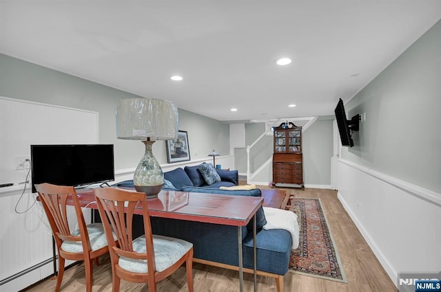 39 N 5th St, Park Ridge, NJ 07656 - living room featuring a baseboard radiator, stairway, wood finished floors, and recessed lighting
