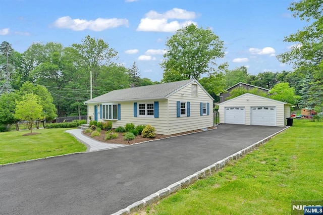 39 N 5th St, Park Ridge, NJ 07656 - ranch-style home with a garage, an outdoor structure, and a front lawn