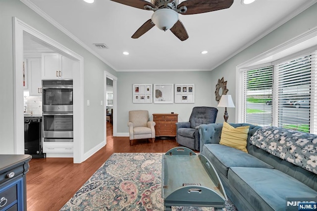 39 N 5th St, Park Ridge, NJ 07656 - living area featuring recessed lighting, ceiling fan, dark wood finished floors, and ornamental molding