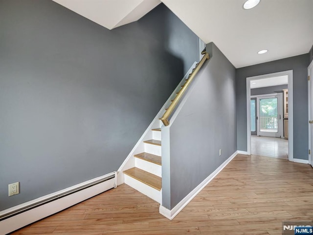 39 Daniels Dr, Clifton, NJ 07013 - staircase featuring a baseboard heating unit, baseboards, wood finished floors, and recessed lighting