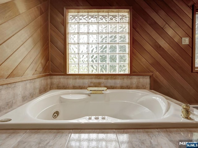 39 Daniels Dr, Clifton, NJ 07013 - full bathroom with a tub with jets and wooden walls