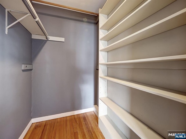 39 Daniels Dr, Clifton, NJ 07013 - spacious closet featuring hardwood / wood-style floors