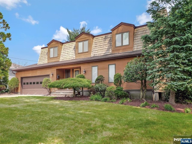 39 Daniels Dr, Clifton, NJ 07013 - view of front of house featuring a front lawn and an attached garage