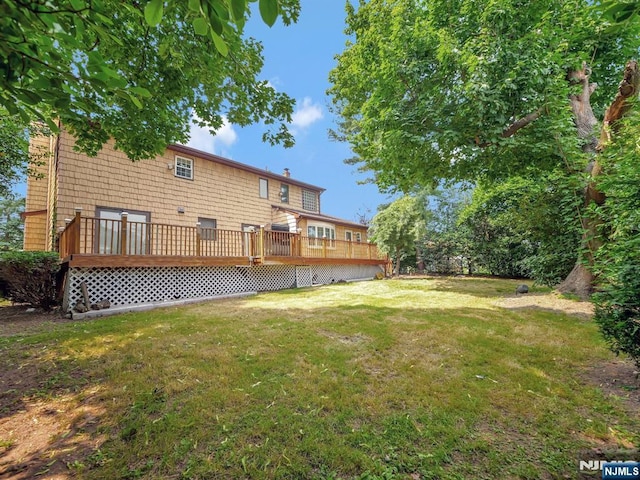 39 Daniels Dr, Clifton, NJ 07013 - rear view of house featuring a yard and a deck