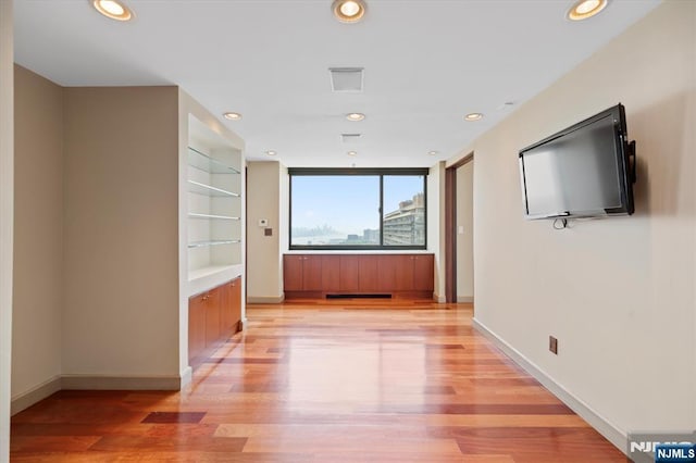 200 Old Palisade Unit Ph4/5, Fort Lee, NJ 07024 - corridor with light wood-style flooring, built in features, and recessed lighting