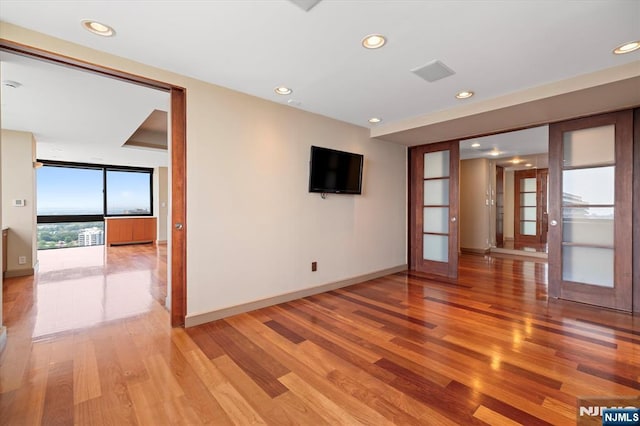 200 Old Palisade Unit Ph4/5, Fort Lee, NJ 07024 - spare room featuring light wood-style floors, recessed lighting, and french doors