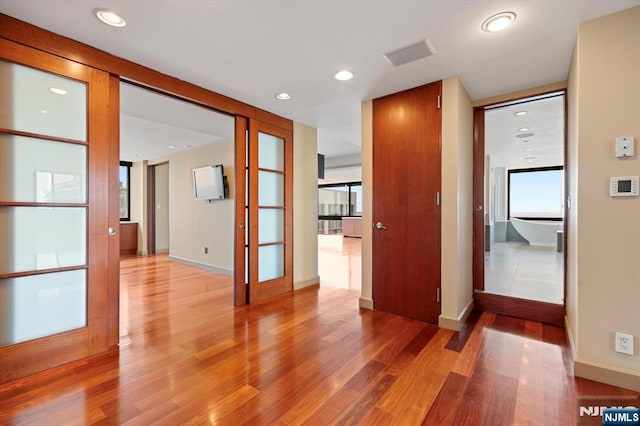 200 Old Palisade Unit Ph4/5, Fort Lee, NJ 07024 - unfurnished room featuring light wood-type flooring, healthy amount of natural light, and recessed lighting