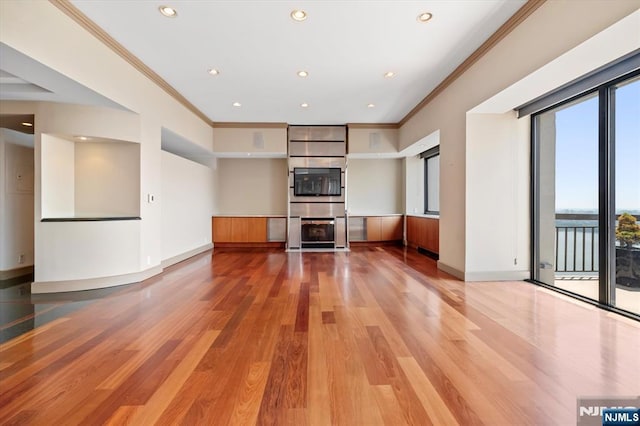 200 Old Palisade Unit Ph4/5, Fort Lee, NJ 07024 - unfurnished living room with crown molding, light wood-style floors, and recessed lighting