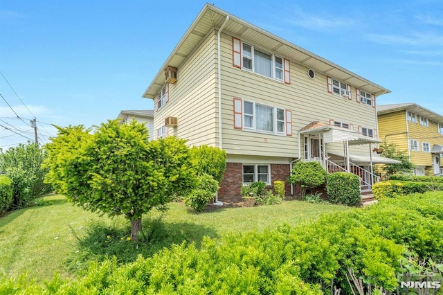 15 Jersey St, East Rutherford, NJ 07073 - back of house with a yard