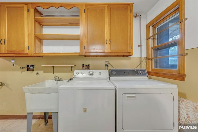 15 Jersey St, East Rutherford, NJ 07073 - laundry area with cabinet space and washer and dryer