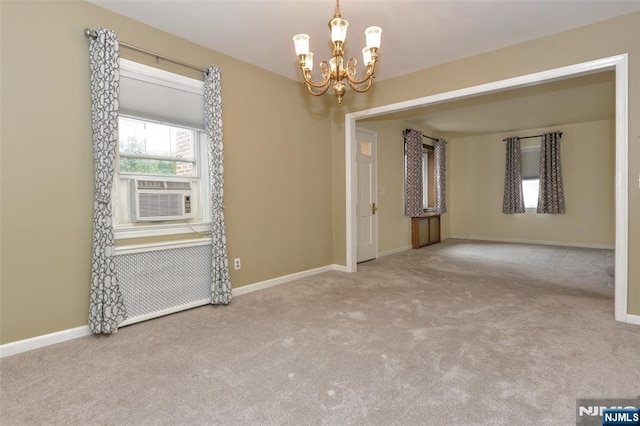 62 Overlook Ave, North Haledon, NJ 07508 - carpeted empty room with a chandelier and cooling unit