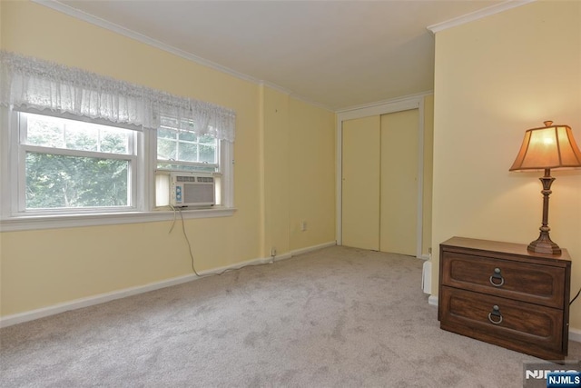 62 Overlook Ave, North Haledon, NJ 07508 - unfurnished bedroom featuring carpet, ornamental molding, cooling unit, and a closet
