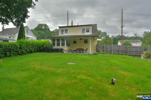 62 Overlook Ave, North Haledon, NJ 07508 - back of house featuring a fenced backyard, a ceiling fan, and a patio area