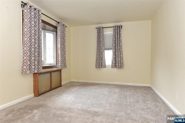 62 Overlook Ave, North Haledon, NJ 07508 - carpeted spare room with baseboards and radiator
