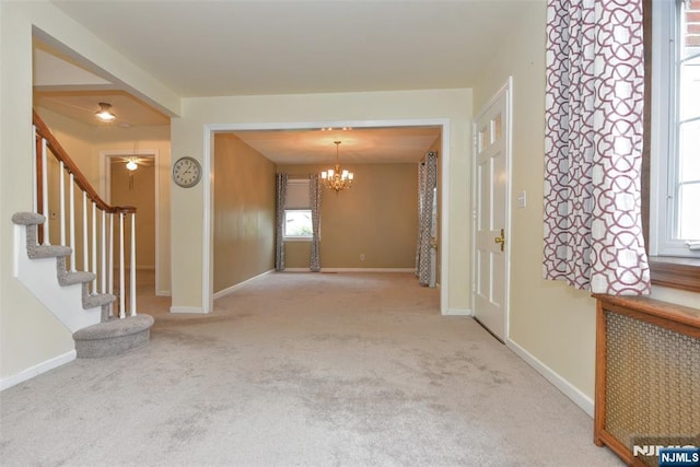 62 Overlook Ave, North Haledon, NJ 07508 - carpeted foyer with a chandelier and stairs
