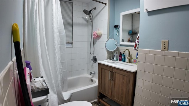 20 2nd Ave, Paterson, NJ 07524 - bathroom featuring tile walls, shower / tub combo with curtain, and vanity