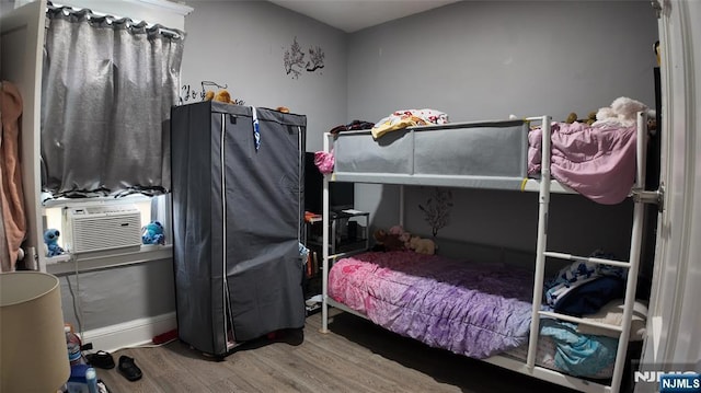 20 2nd Ave, Paterson, NJ 07524 - bedroom featuring wood finished floors and cooling unit