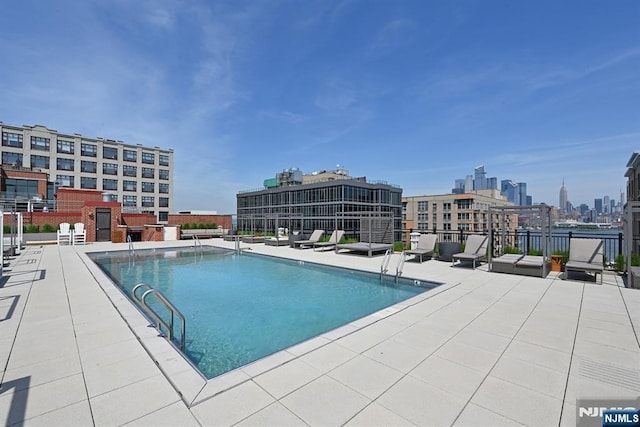 1400 Hudson St Unit 730, Hoboken, NJ 07030 - community pool featuring a city view and a patio area