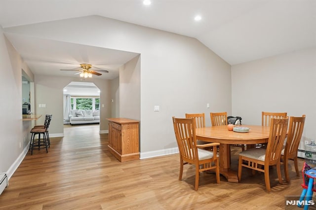 4 Lenape Trl, Wayne, NJ 07470 - dining area with vaulted ceiling, light wood finished floors, a baseboard radiator, ceiling fan, and baseboards