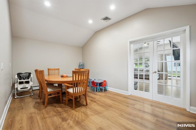 4 Lenape Trl, Wayne, NJ 07470 - dining area featuring lofted ceiling, baseboards, light wood finished floors, french doors, and recessed lighting