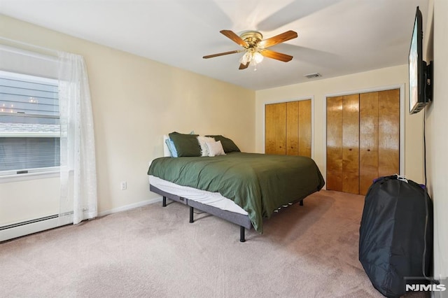 4 Lenape Trl, Wayne, NJ 07470 - bedroom with carpet flooring, multiple closets, a ceiling fan, and a baseboard heating unit