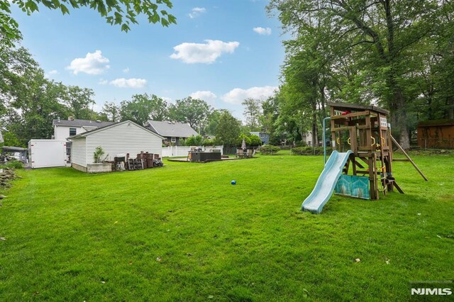 4 Lenape Trl, Wayne, NJ 07470 - view of yard featuring a playground