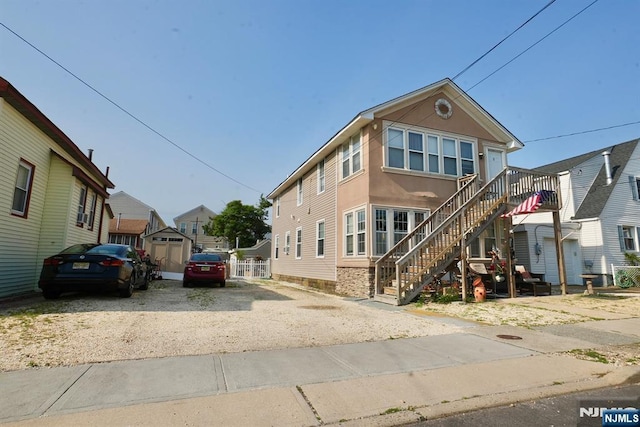 214 Franklin Ave, Seaside Heights, NJ 08751 - view of property featuring stairs and a residential view