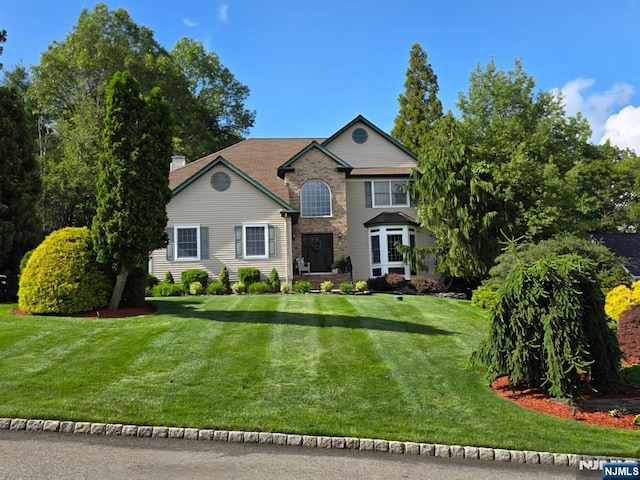 6 Anna Rose Ct, Bloomingdale, NJ 07403 - traditional-style home with a front lawn and a chimney