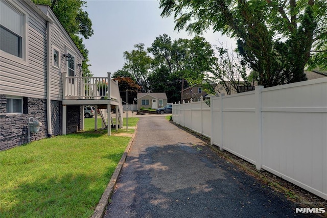 21 Bartholdi Ave, Wanaque, NJ 07420 - view of street with stairs and a residential view