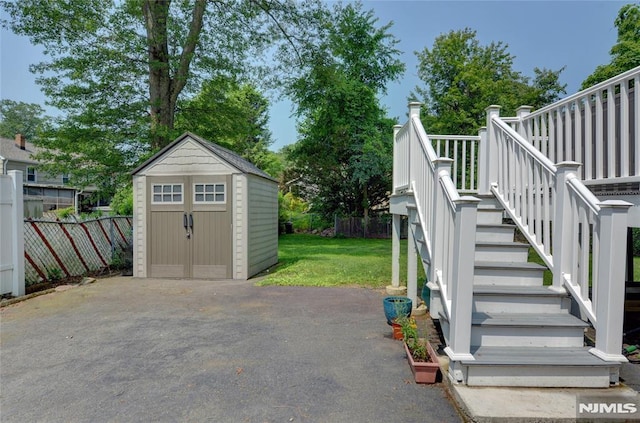 21 Bartholdi Ave, Wanaque, NJ 07420 - view of patio / terrace with stairway and a storage shed
