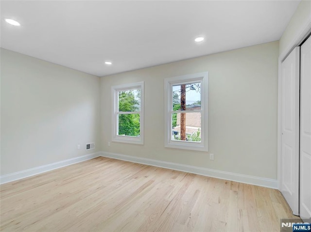 138 Willow St, Bloomfield, NJ 07003 - unfurnished bedroom featuring light wood finished floors, a closet, and recessed lighting
