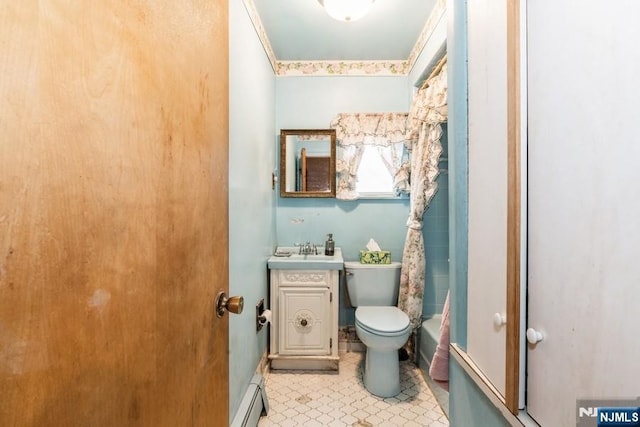 149 Springfield Ave, Rutherford, NJ 07070 - bathroom with vanity, shower / bath combo with shower curtain, and baseboard heating