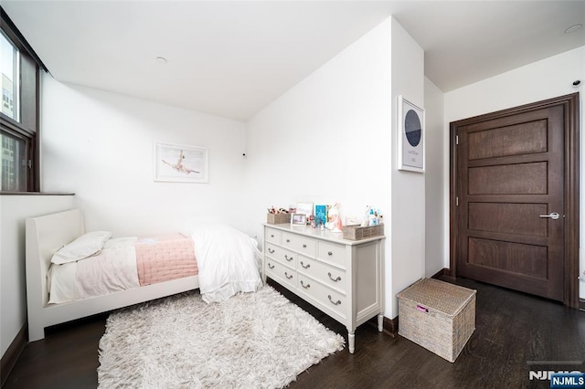 9 Somerset Ln Unit 201, Edgewater, NJ 07020 - bedroom featuring dark wood-style flooring