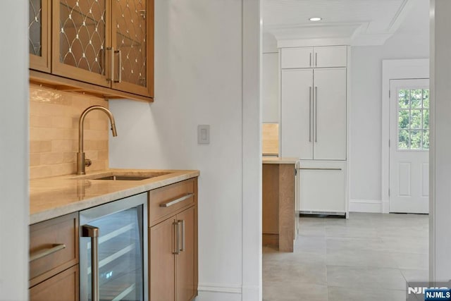 333 Mill Rd, Saddle River, NJ 07458 - indoor wet bar with wine cooler, tasteful backsplash, light tile patterned floors, and recessed lighting