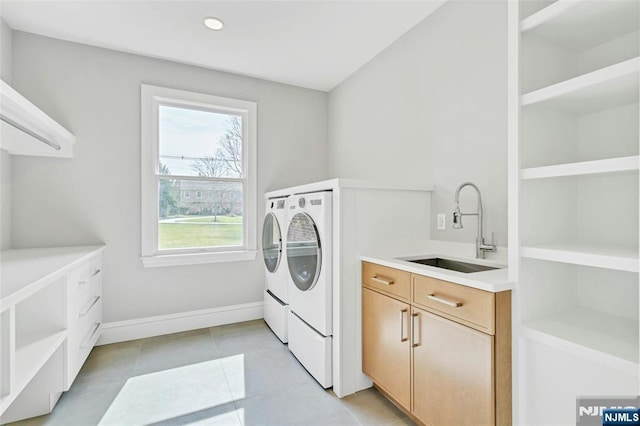 333 Mill Rd, Saddle River, NJ 07458 - washroom with washing machine and clothes dryer, light tile patterned floors, cabinet space, and recessed lighting